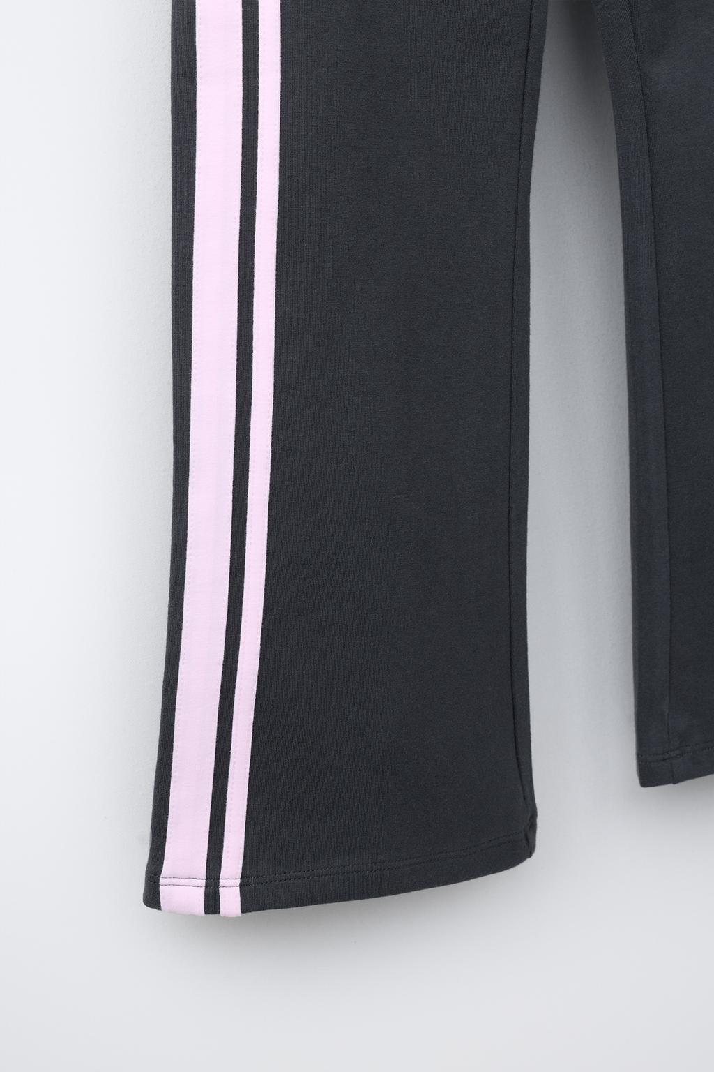 РАСКЛЕШЕННЫЕ ЛЕГИНСЫ С ЛАМПАСАМИ