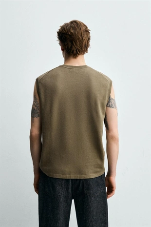 Жилет из рельефного трикотажа- Заказать в России