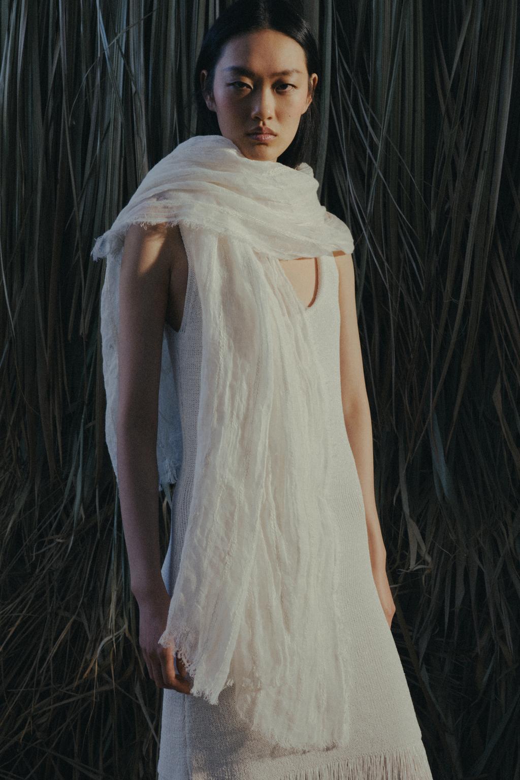 ТРИКОТАЖНОЕ ПЛАТЬЕ С БАХРОМОЙ