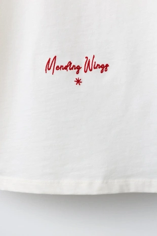 Футболка с вышитой нашивкой- Заказать в России