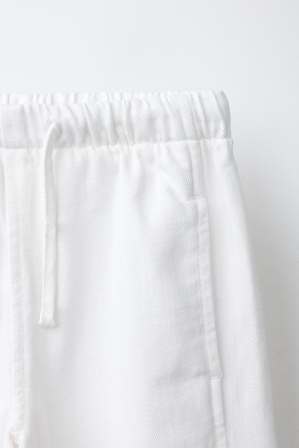 Джинсы широкие с завязками