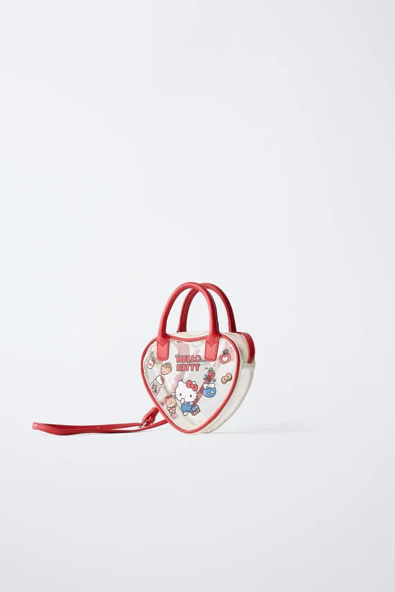 СУМКА С ПЛЕЧЕВЫМ РЕМНЕМ В ФОРМЕ СЕРДЦА HELLO KITTY © SANRIO