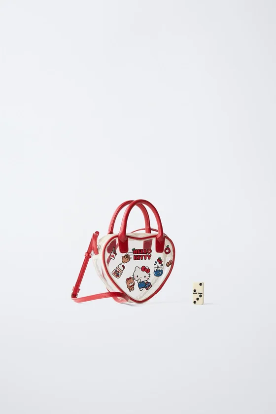 СУМКА С ПЛЕЧЕВЫМ РЕМНЕМ В ФОРМЕ СЕРДЦА HELLO KITTY © SANRIO