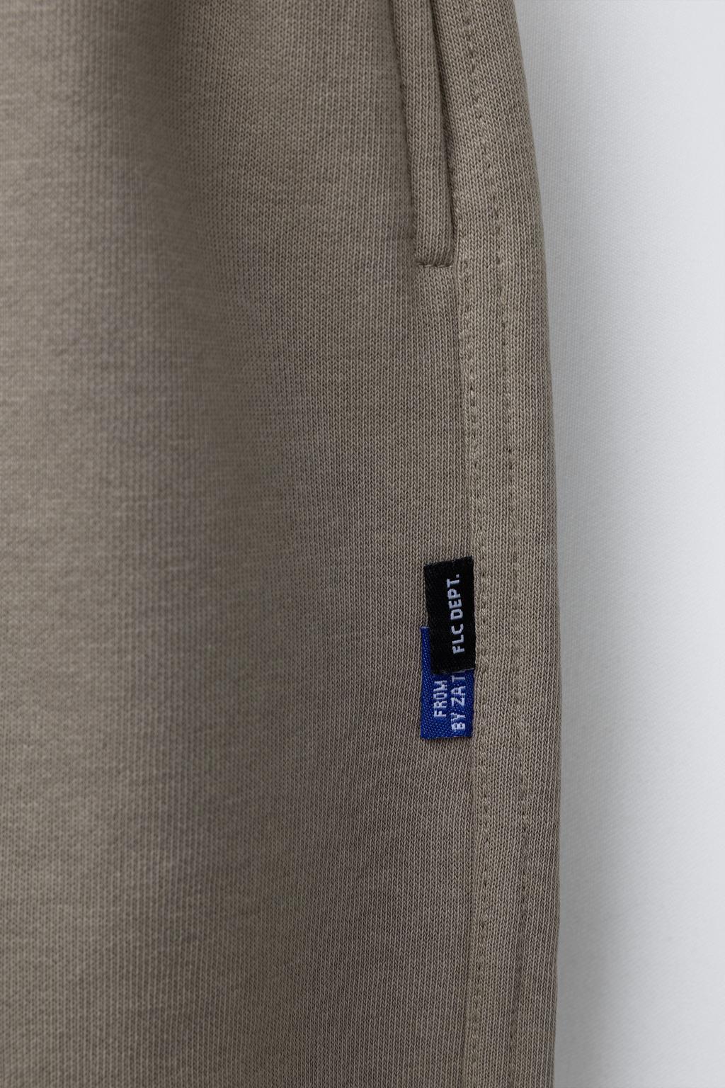 ФЛИСОВЫЕ БРЮКИ BALLOON С ТЕКСТОМ