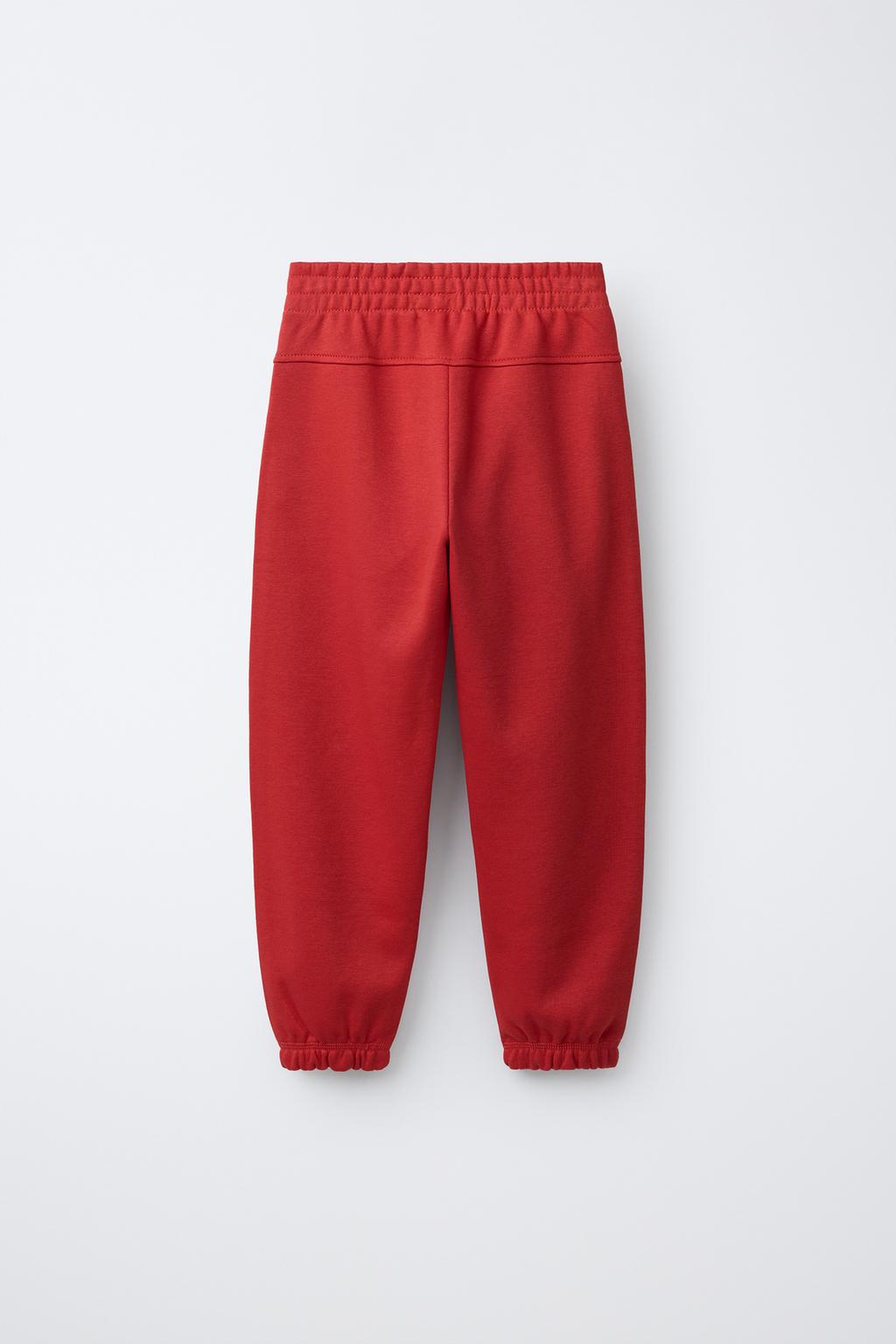 БРЮКИ-ДЖОГГЕРЫ С НАДПИСЬЮ