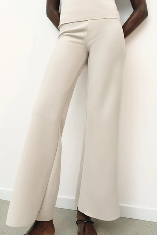 Широкие эластичные брюки- Заказать в России