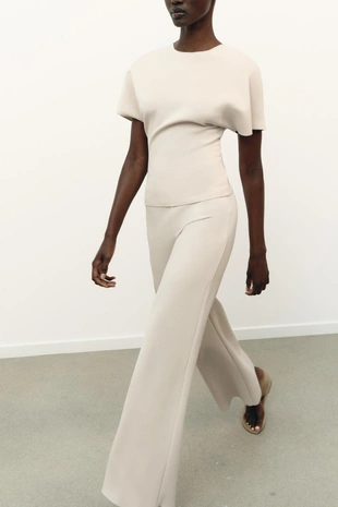 Широкие эластичные брюки- Заказать в России