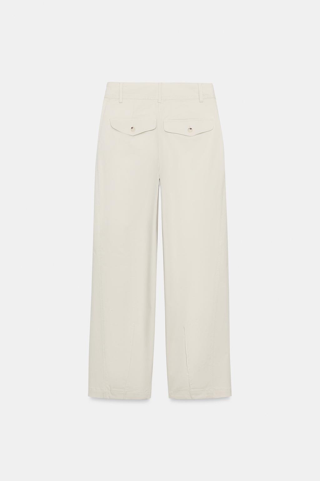 БРЮКИ  С ЗАЩИПАМИ