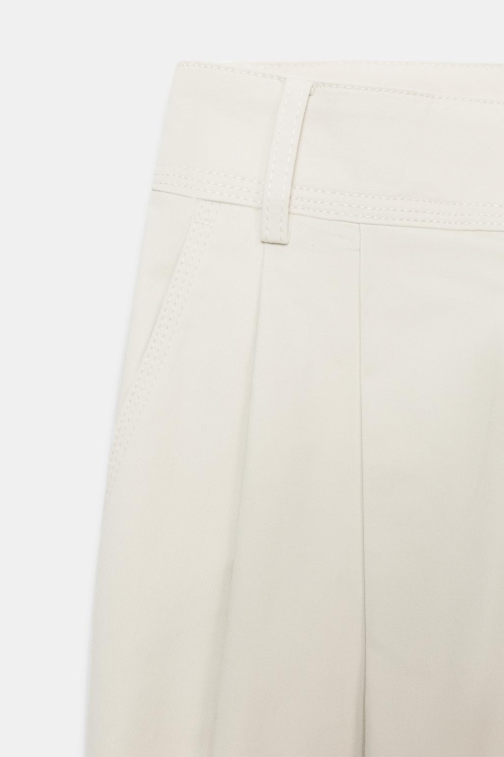 БРЮКИ  С ЗАЩИПАМИ