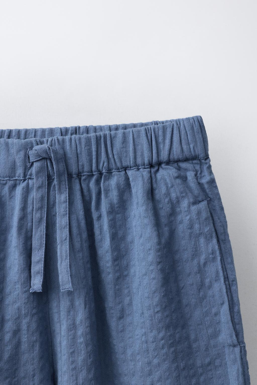 БРЮКИ-КЮЛОТЫ С ВЫШИВКОЙ И ЦВЕТОЧНЫМ ПРИНТОМ