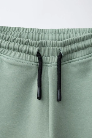 Брюки-джоггеры из ткани интерлок- Заказать в России