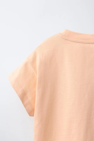 Футболка с вышитой нашивкой- Заказать в России