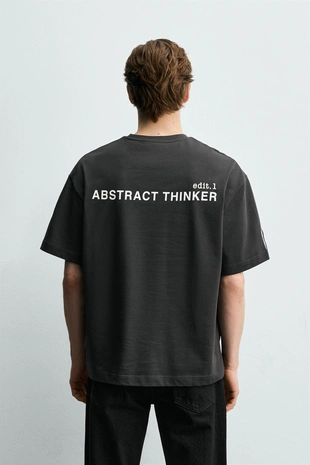 Футболка свободного кроя с контрастным текстом- Заказать в России