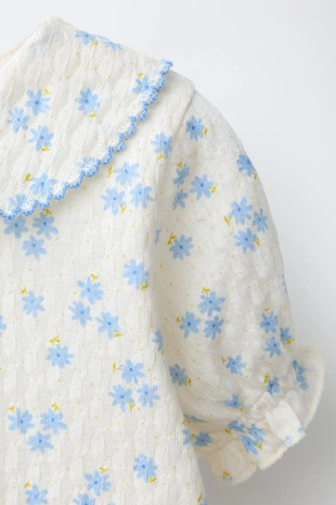 Футболка с цветочным узором- Заказать в России