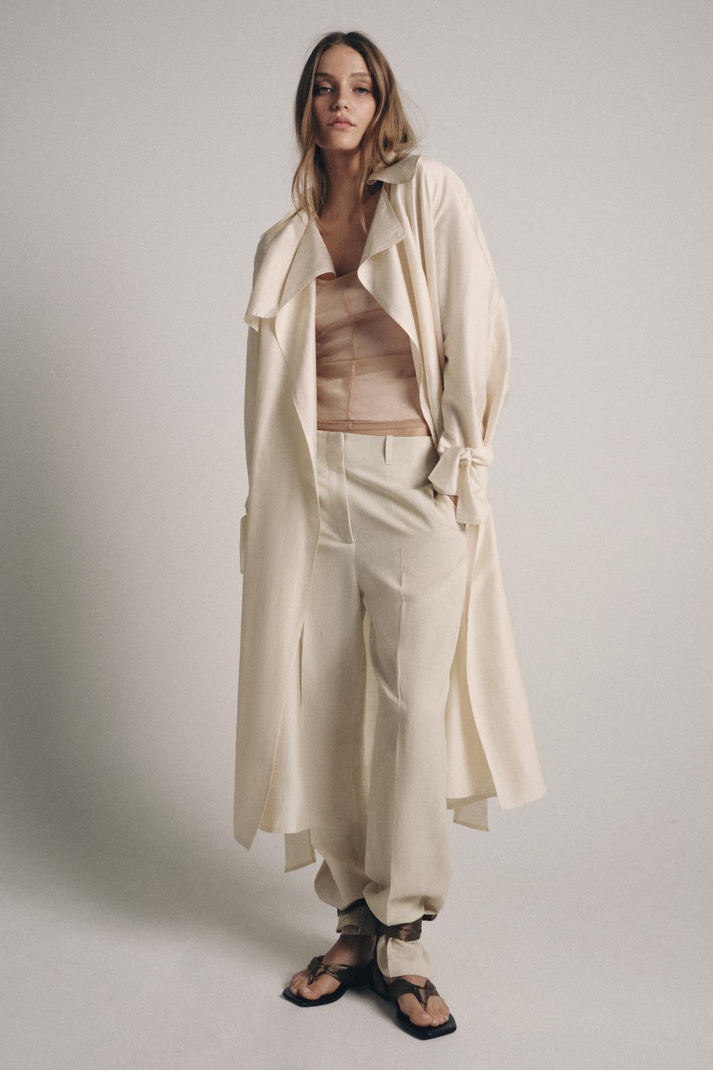 ТОП ИЗ ПОЛУПРОЗРАЧНОЙ ТКАНИ С ДЕКОРАТИВНОЙ СТРОЧКОЙ