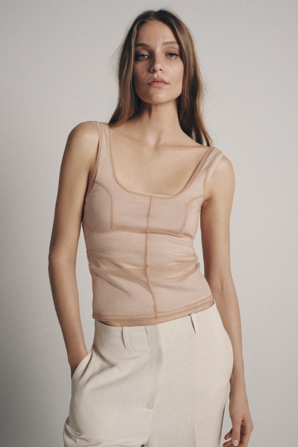 ТОП ИЗ ПОЛУПРОЗРАЧНОЙ ТКАНИ С ДЕКОРАТИВНОЙ СТРОЧКОЙ