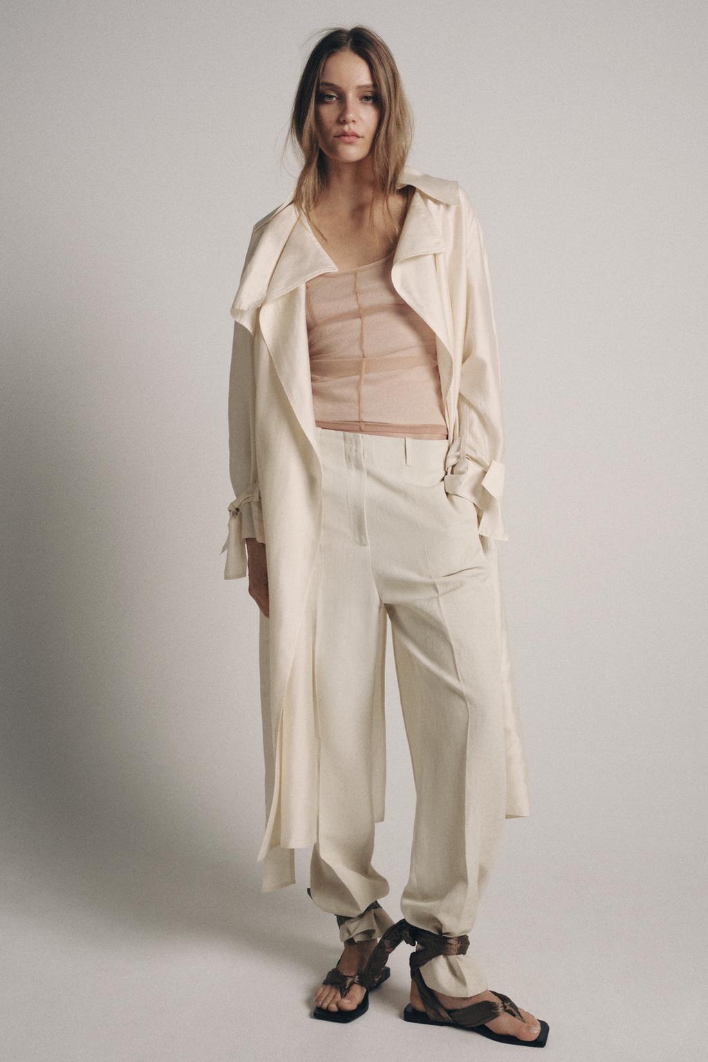 ТОП ИЗ ПОЛУПРОЗРАЧНОЙ ТКАНИ С ДЕКОРАТИВНОЙ СТРОЧКОЙ