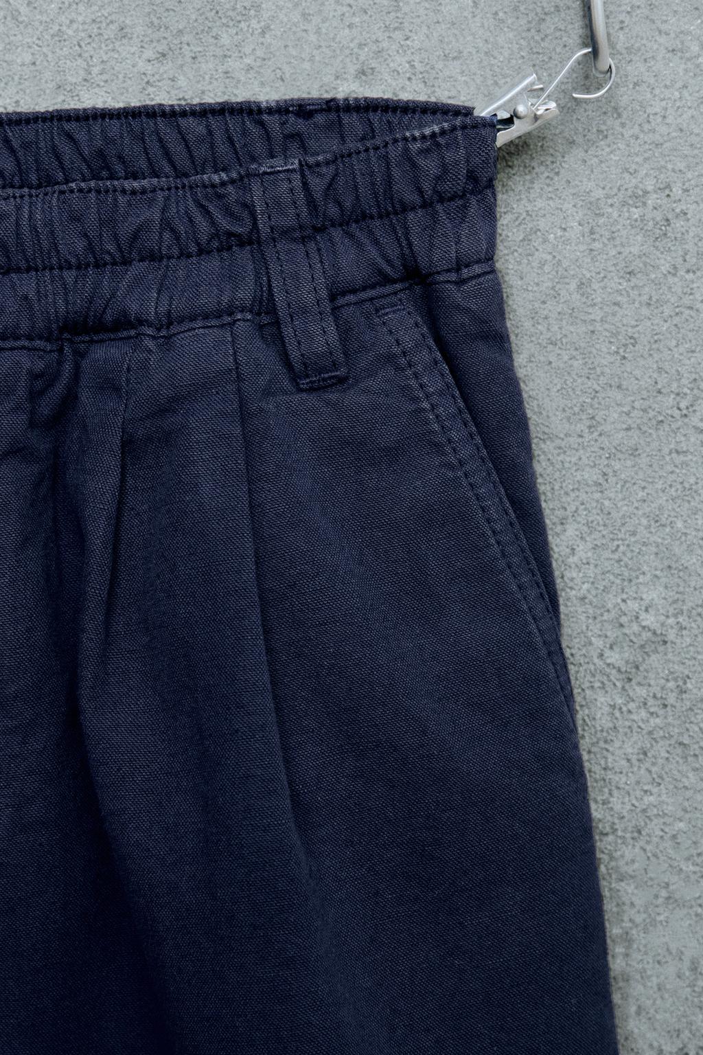 STORIESZ — БРЮКИ-БАГГИ С ЗАЩИПАМИ ИЗ ХЛОПКА И ЛЬНА