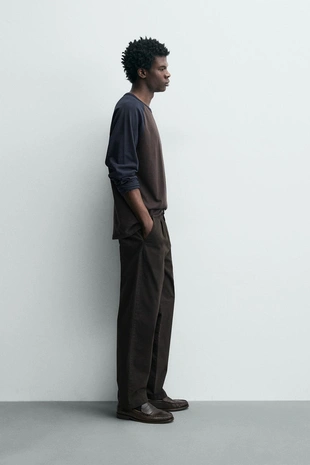 Широкие брюки со свободным кроем и складками- Заказать в России