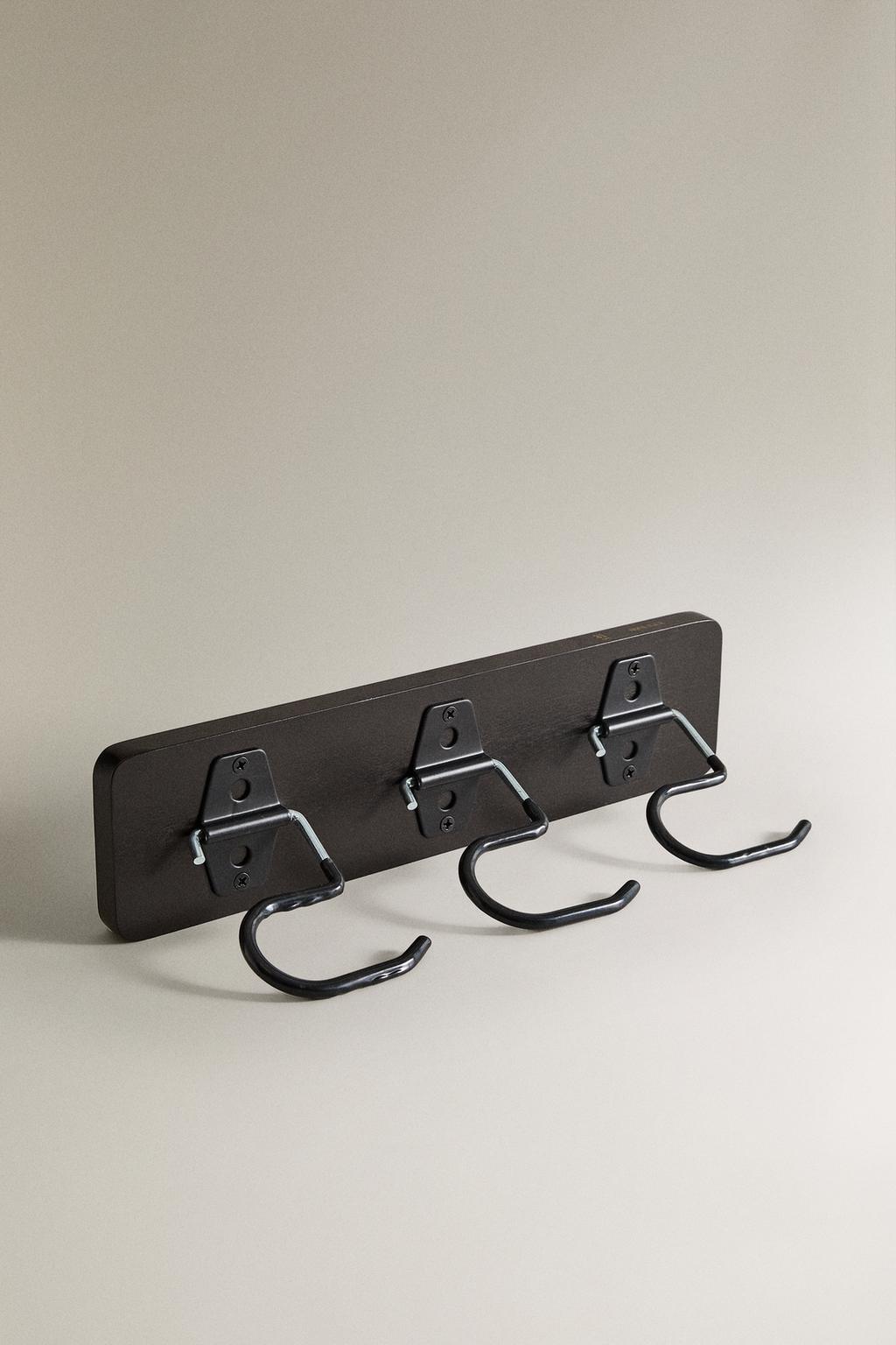 Настенная вешалка с крючками из силикона