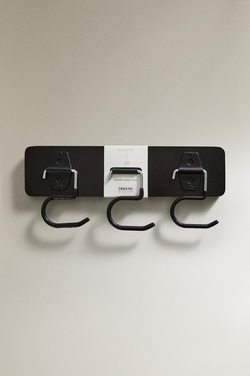 Настенная вешалка с крючками из силикона