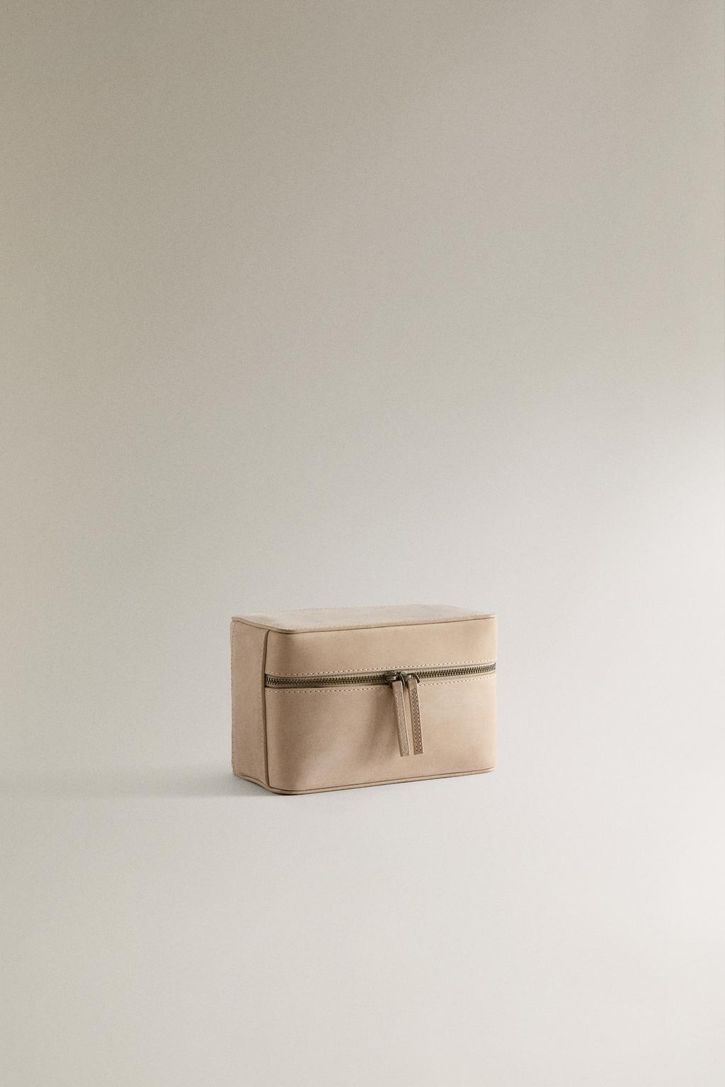 Кожаная косметичка для украшений на поездку