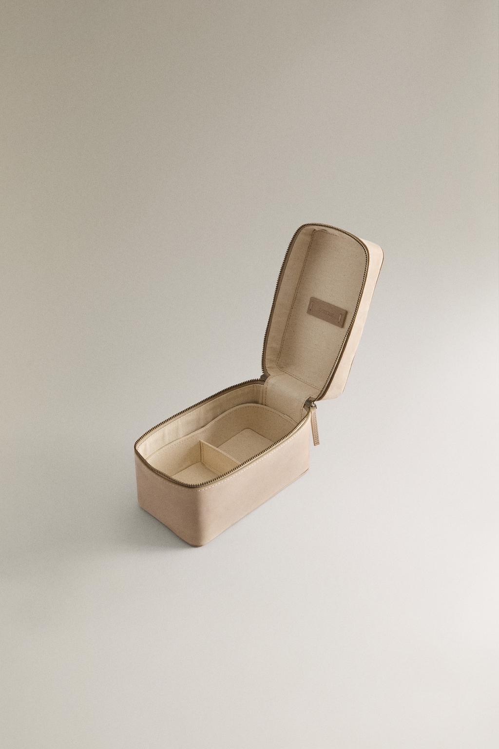 Кожаная косметичка для украшений на поездку