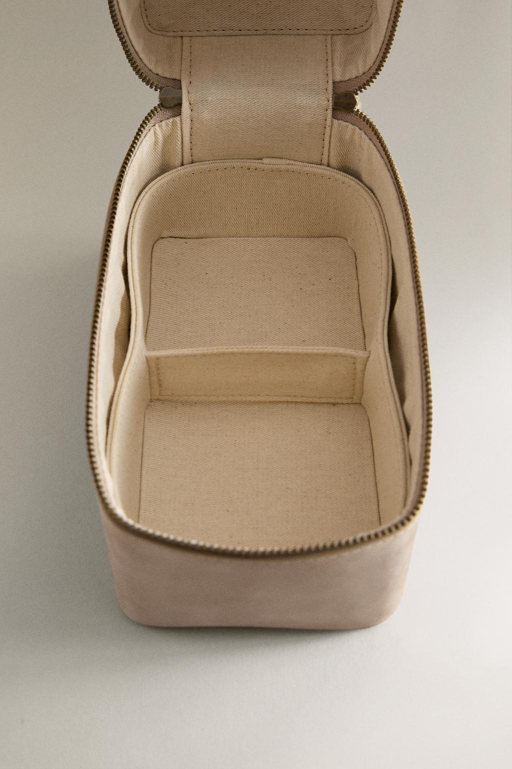 Кожаная косметичка для украшений на поездку