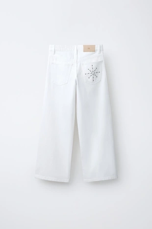 Джинсы Wide Leg с заклепками- Заказать в России