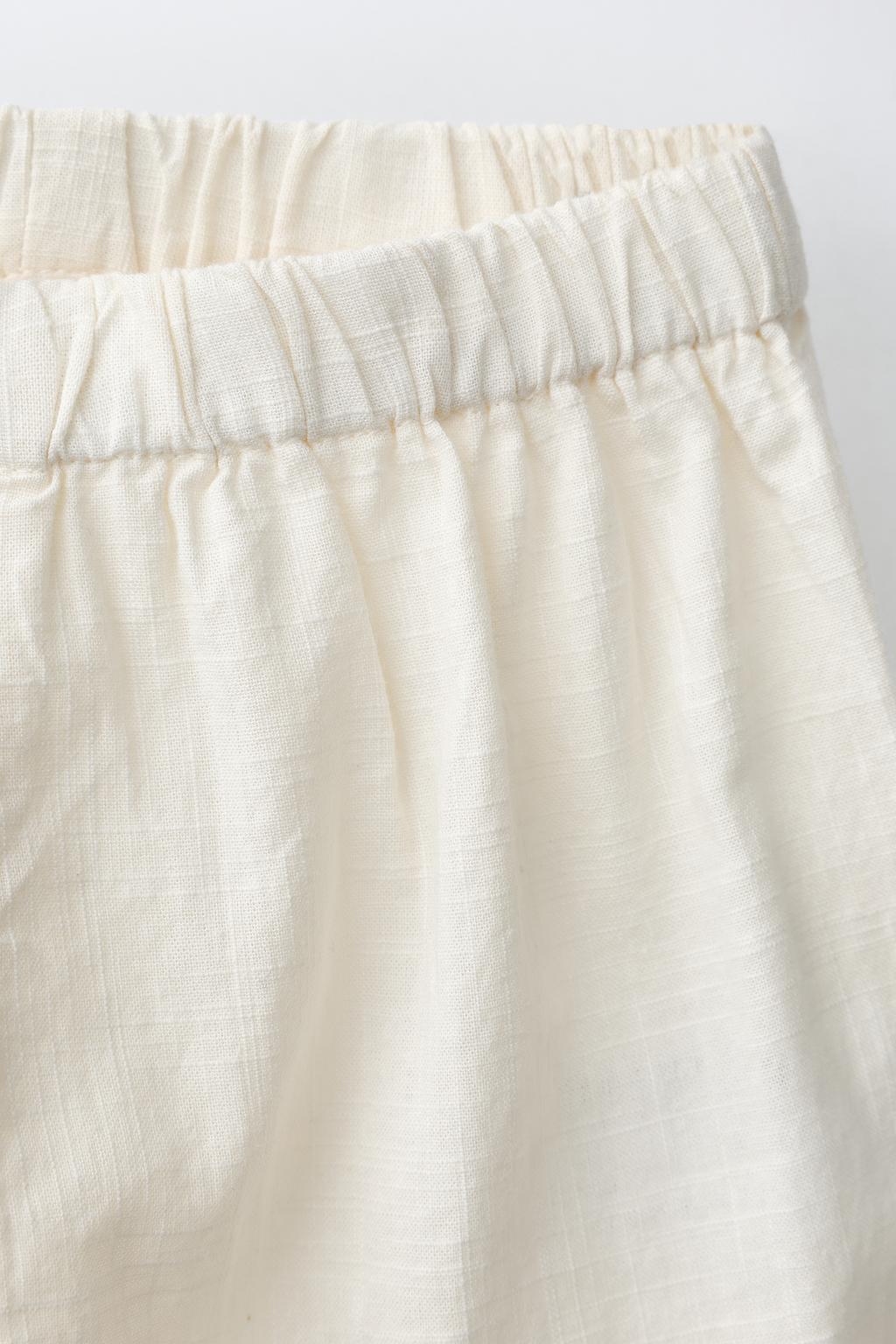 БРЮКИ С ВЫШИВКОЙ И КАРМАНОМ