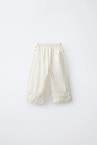 Брюки с вышивкой и карманом- Заказать в России