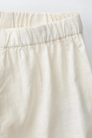 Брюки с вышивкой и карманом- Заказать в России