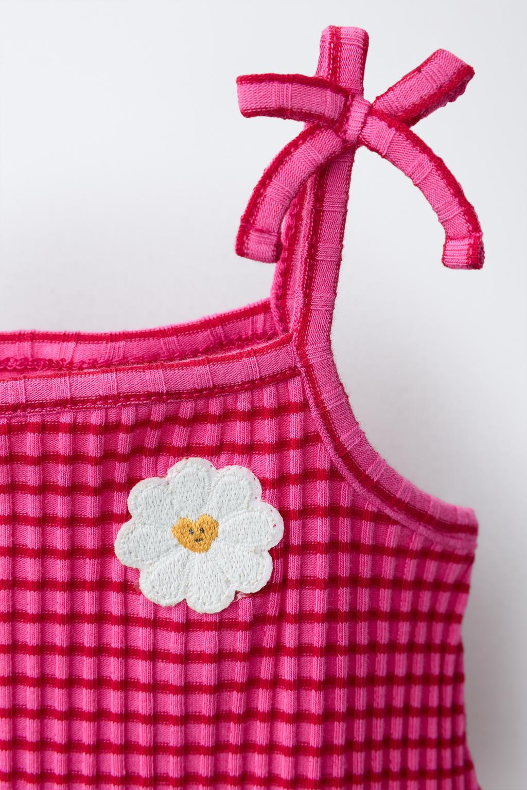 КОМБИНЕЗОН В ПОЛОСКУ С ЦВЕТКОМ