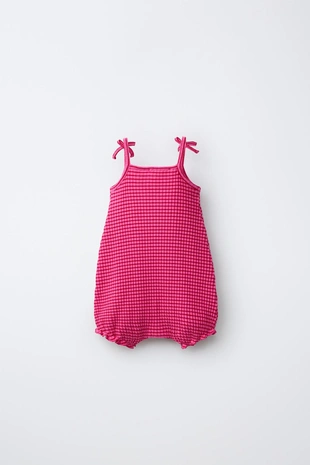 Комбинезон в полоску с цветком- Заказать в России