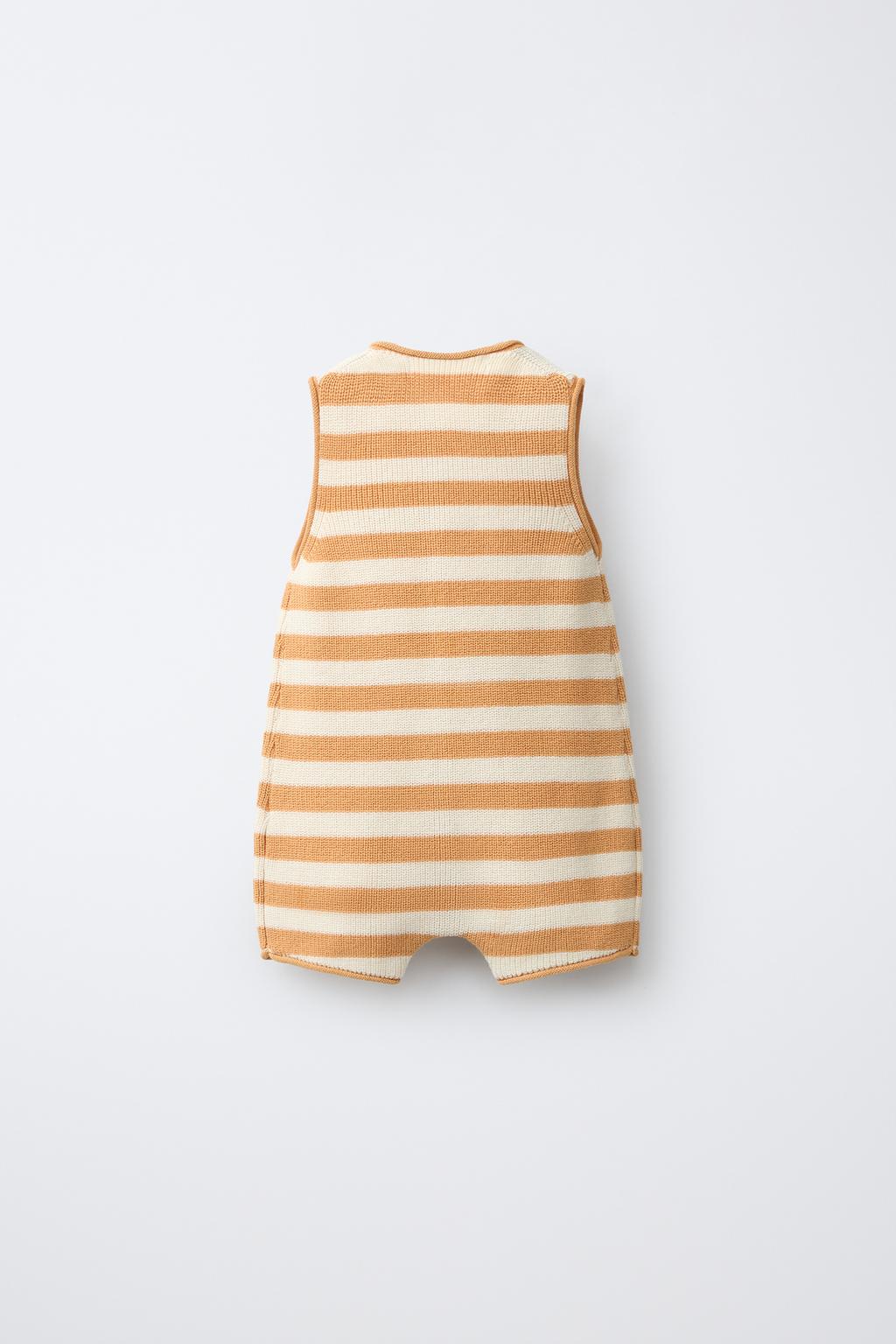 ВЯЗАНЫЙ ПЕСОЧНИК В ПОЛОСКУ С ВЫШИТОЙ ЛОДКОЙ