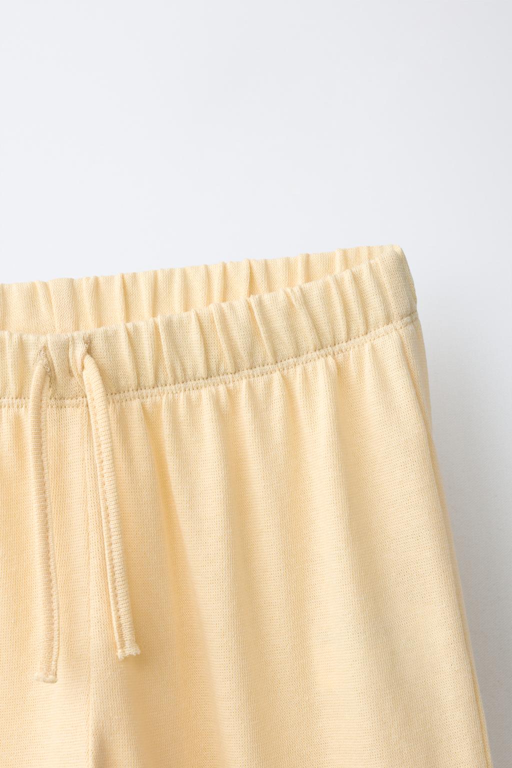 КОМПЛЕКТ ИЗ ФУТБОЛКИ И БРЮК WIDE LEG