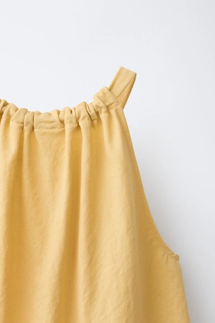 Топ с горловиной халтер- Заказать в России