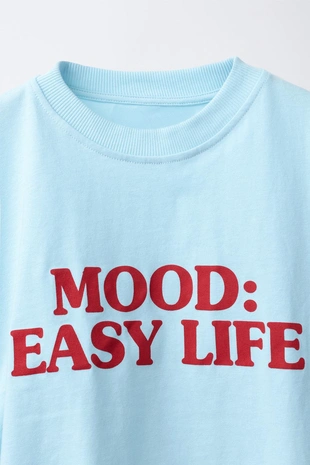 Футболка с надписью и драпировкой- Заказать в России