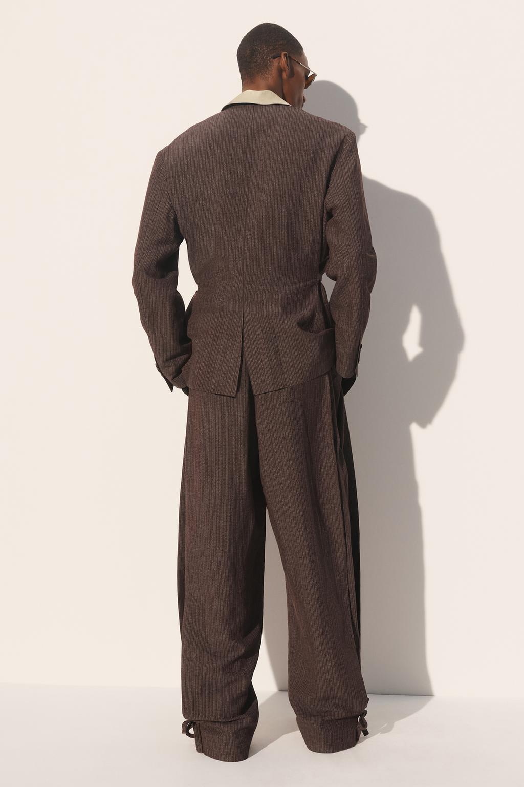 Широкие брюки в полоску из вискозы и льна с боковыми складками