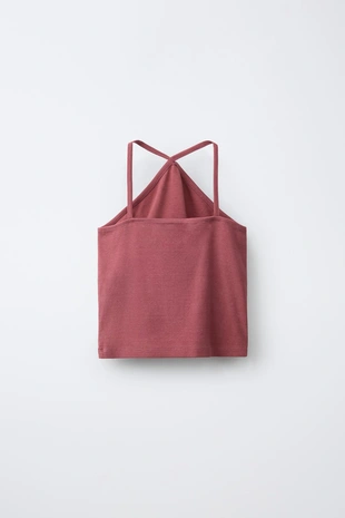 Топ с горловиной халтер и заклепками- Заказать в России