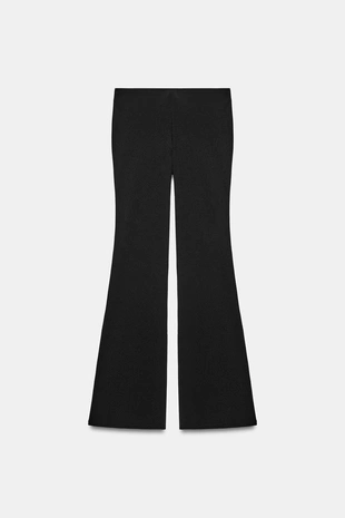 Расклешенные брюки стрейч в горошек