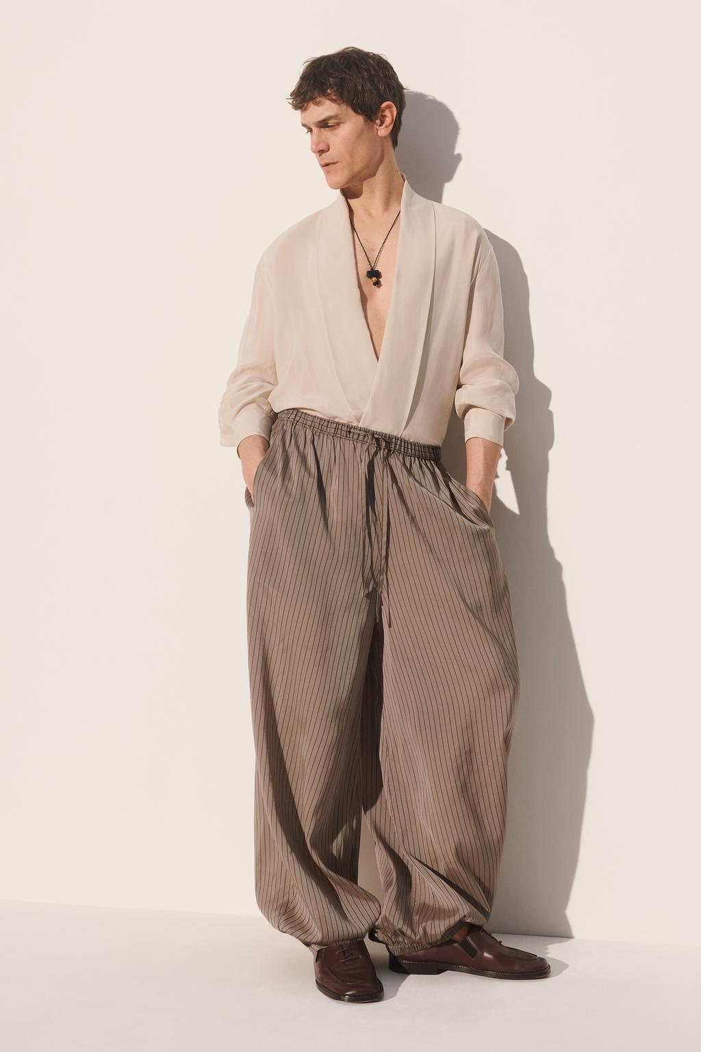 Брюки свободного кроя из вискозы и купро в полоску