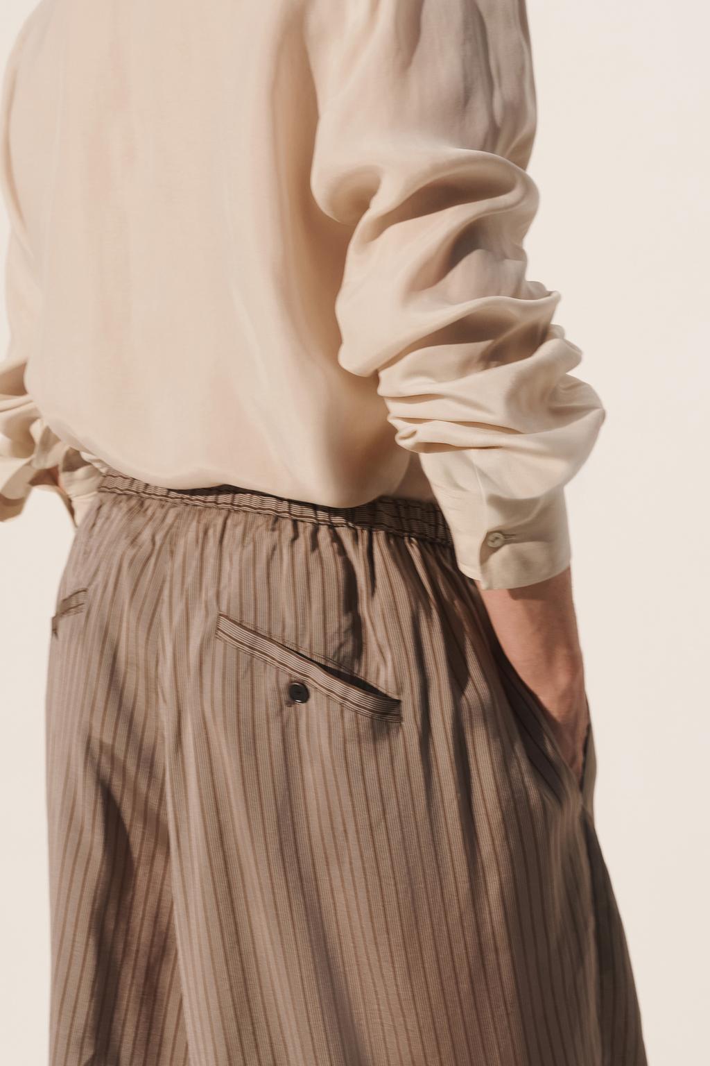 Брюки свободного кроя из вискозы и купро в полоску