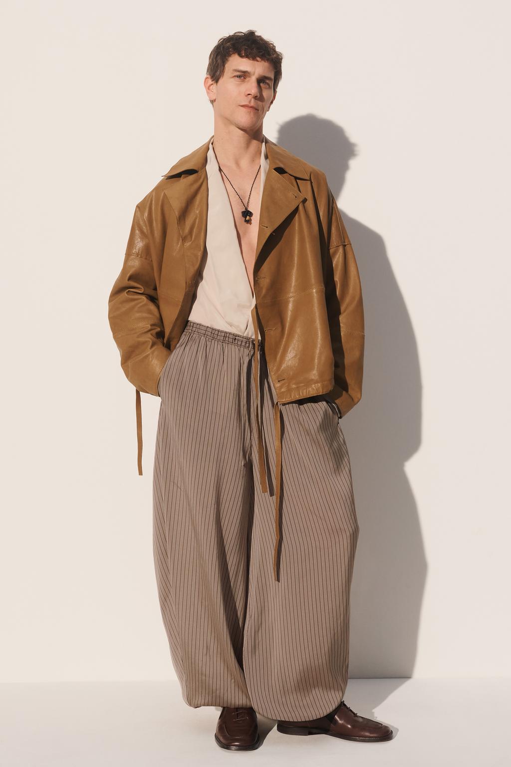 Брюки свободного кроя из вискозы и купро в полоску