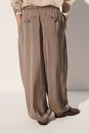 Брюки свободного кроя из вискозы и купро в полоску- Заказать в России