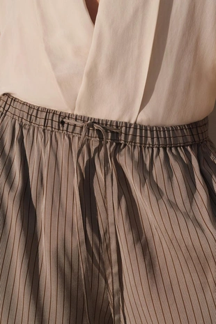 Брюки свободного кроя из вискозы и купро в полоску- Заказать в России