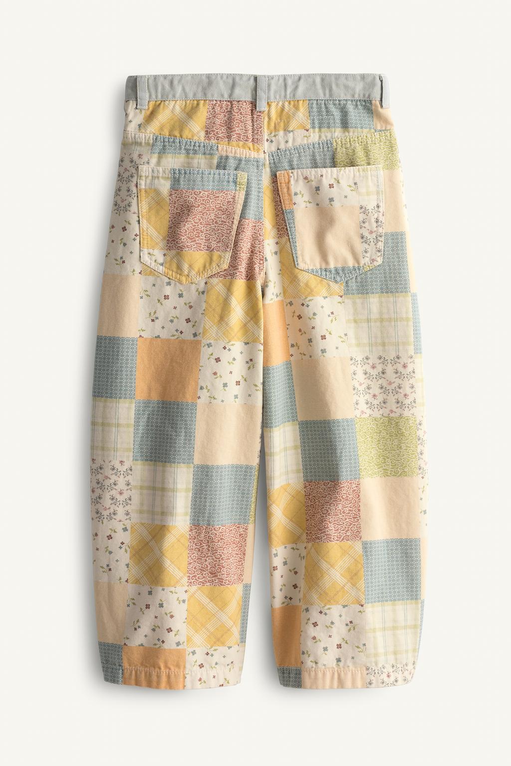 Брюки с бочком и лоскутным дизайном