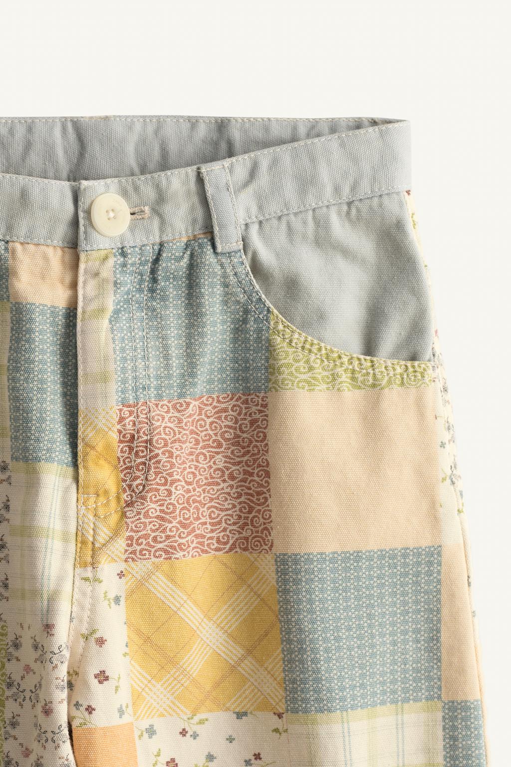 Брюки с бочком и лоскутным дизайном