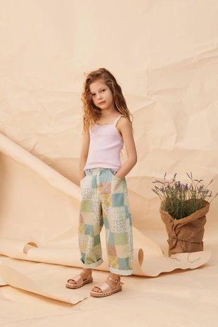 Брюки с бочком и лоскутным дизайном- Заказать в России