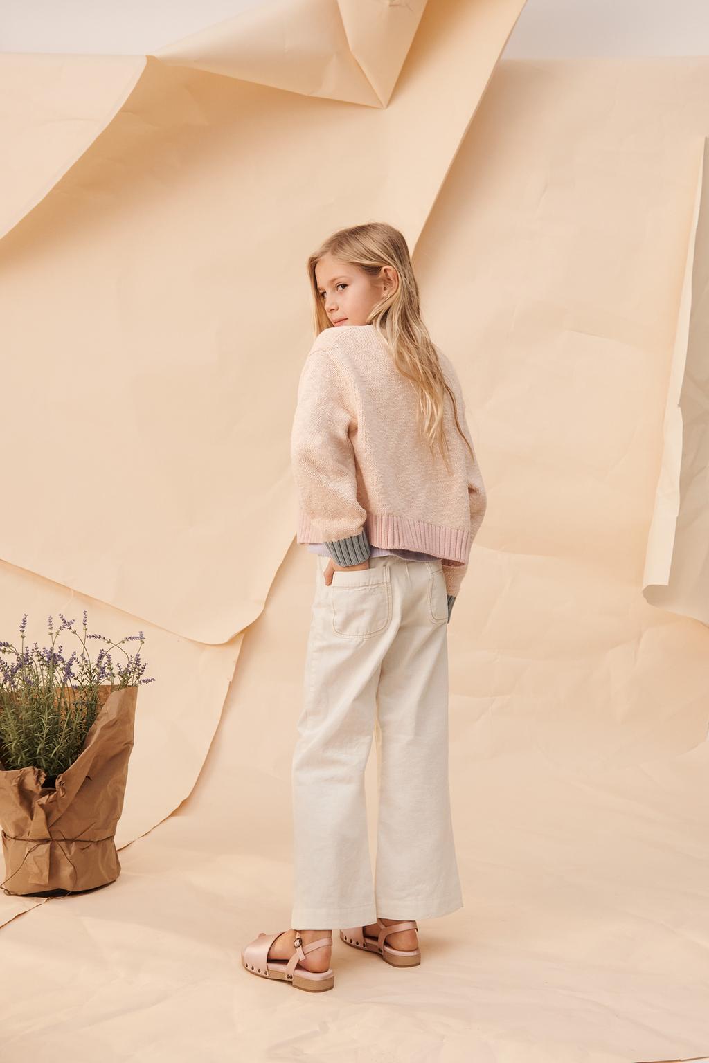 Брюки limited edition с расклешенными штанинами и контрастной строчкой